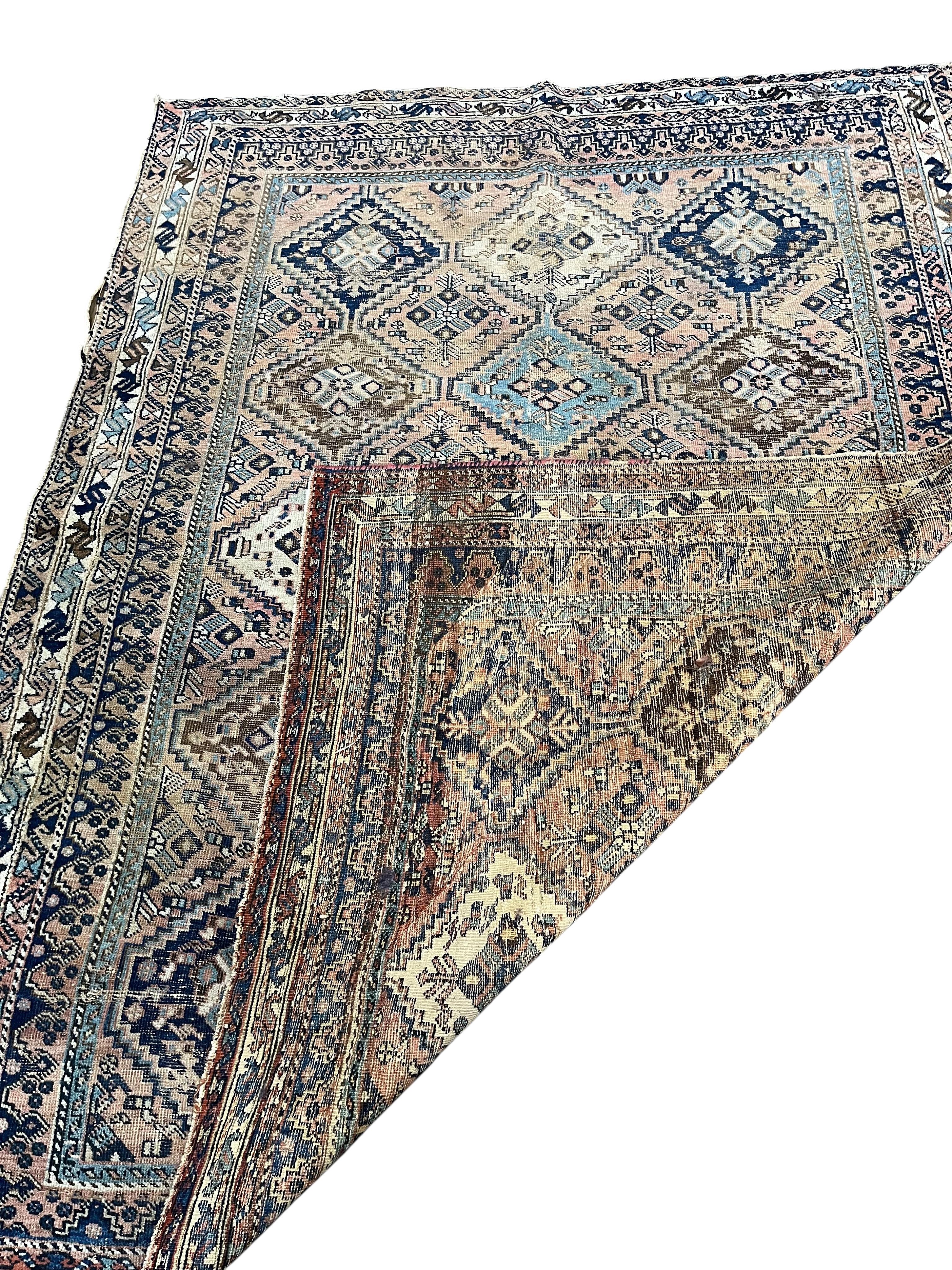 A Caucasian peach ground rug, 190 x 148cm